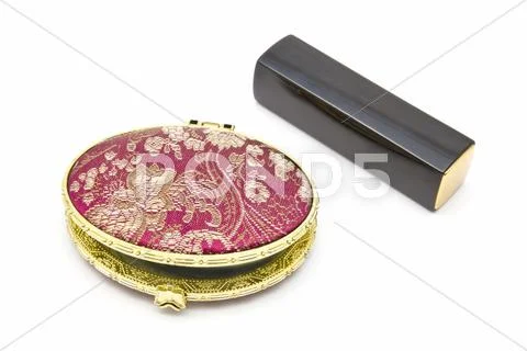 Red cosmetic mirror and lipstick Stock Photos