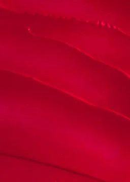 Red cosmetic texture background, make-up and skincare cosmetics product, crea Stock Photos
