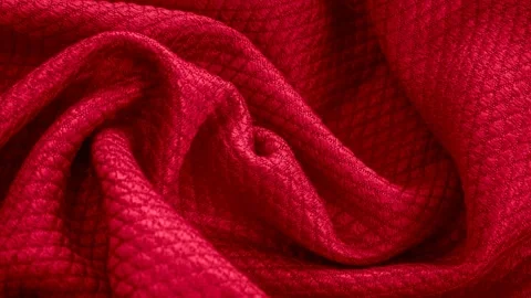 Red cotton fabric with an interesting pattern Stock Footage 302209470