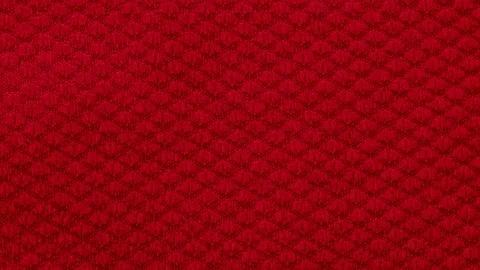 Red cotton fabric with an interesting pattern Stock Footage 317267951