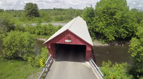 Red Covered Bridge Crane up with Tilt Down Stock Footage 63872167