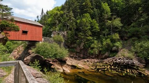 Red covered bridge at Point Wolf in Fundy National Park New Brunswick Canada Stock Photos