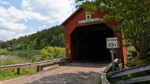 Red covered bridge at Point Wolf in Fundy National Park New Brunswick Canada Stock Photos