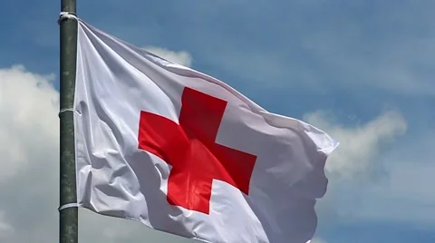 Red cross flag in the wind Stock Footage 51513680