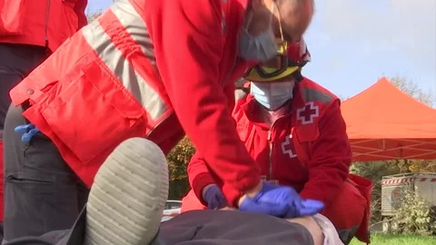 RED CROSS REANIMATING SIMULATION Stock Footage 166732138