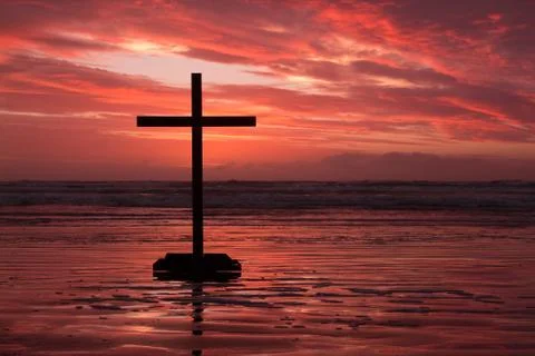 Red cross sunset Stock Photos