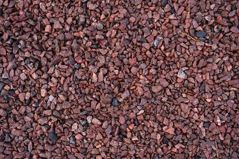 Red crushed stone, horizontal background for design Stock Photos