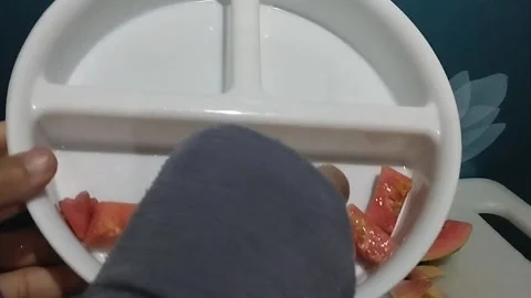 Red crystal guava fruit which is cut into small cubes Stock Footage 229254989