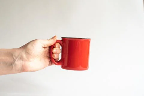 Red cup with a black edging Stock Photos