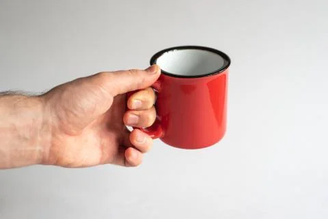 Red cup with a black edging Stock Photos