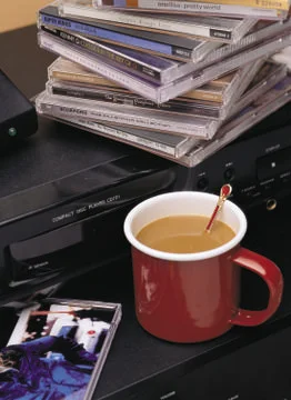 Red Cup of coffee with stuff at the backstage Stock Photos