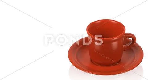 Red cup on a red saucer Stock Photos