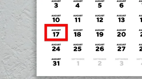 Red cursor highlighting August 17th on a 2026 wall calendar page Video stock 339424551