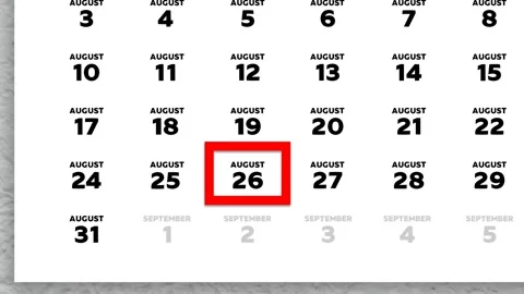 Red cursor highlighting August 26th on a 2026 wall calendar page Stock Footage 340208931