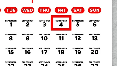 Red cursor highlighting September 4th on a 2026 wall calendar page Stock Footage 341508187