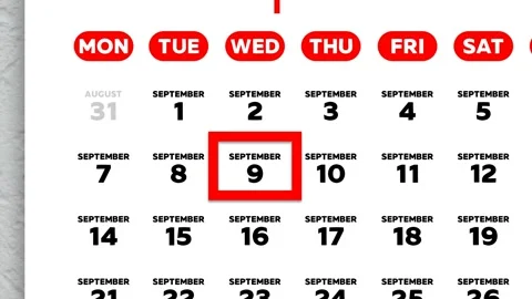 Red cursor highlighting September 9th on a 2026 wall calendar page Stock Footage 341814517