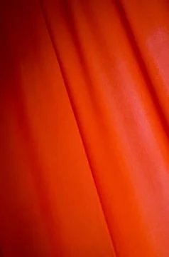 Red Curtain drape background Flag MayDay Foto stock