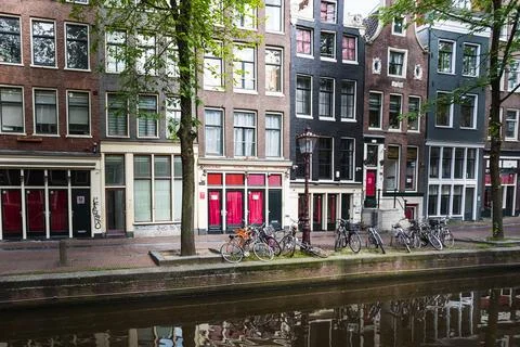 Red curtains closed in the Red Light district Stock Photos
