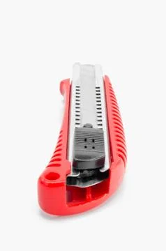 Red cutter on white background. Stock-Fotos