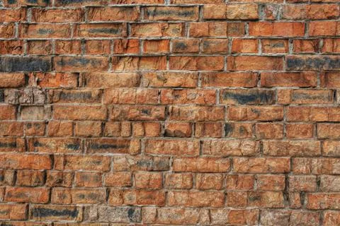 Red damaged brick texture Stock Photos