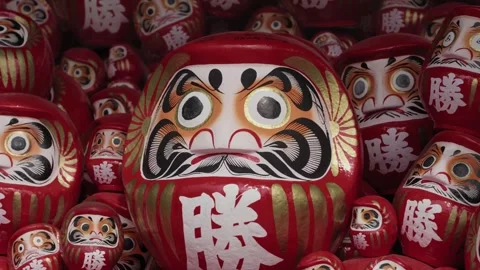 Red Daruma Dolls Stacked with Victory Kanji Japan Stock Footage 343987752