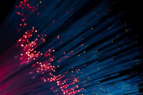 Red Data Particles on Blue Fiber Optic Lines, Network Technology Concept Stock Photos