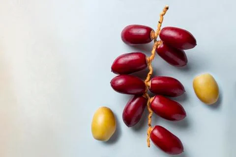 Red dates fruit on white background Stock Photos