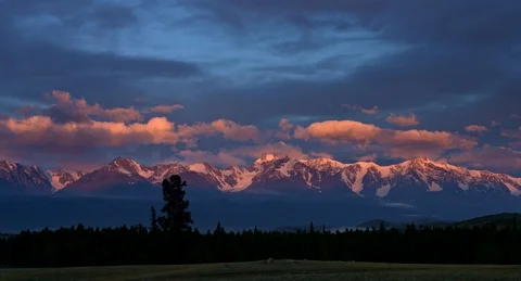 Red dawn in the mountains TL (4k) Stock Footage 98143157