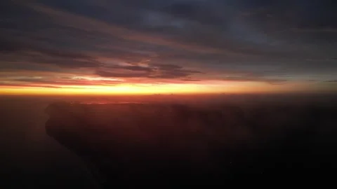 Red Dawn Over Sinanche: A Serene Sunrise on the Gulf of Mexico Stock Footage 286062403
