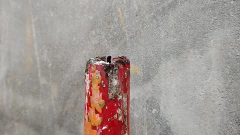 A red decorative candle that was extinguished by the wind Stock Footage 302364869