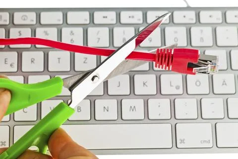 The red, defective cable of a network from a computer. Austria Stock Photos