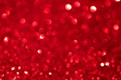 Red defocused glitter backround. Stock Photos