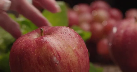 Red delicious apple being sliced in slo motion by knife Stock Footage 123847660