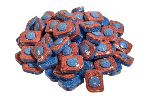 Red detergent tablets with blue core wrapped in transparent film Stock Photos