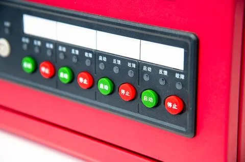A red device with buttons in different colors and foreign writing Stock Photos