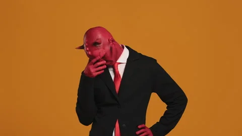 Red devil businessman thinking and posin... | Stock Video | Pond5