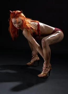Red devil dancer girl Stock Photos