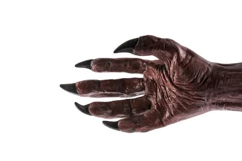 Red devil monster hand isolated on white background Stock Photos