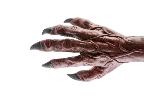 Red devil monster hand isolated on white background with clipping path Stockfoto's