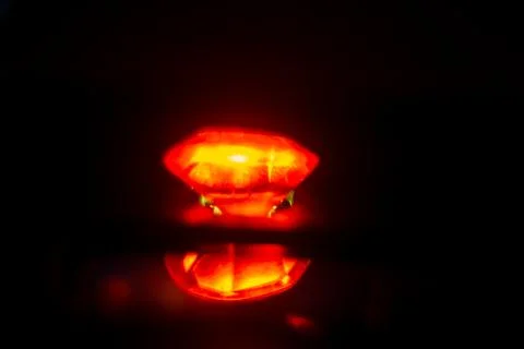 Red diamond on black background Stockfoto's