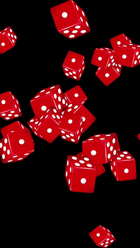 Red Dice Bursting and Falling Against a Black Background Stock Footage 345117916