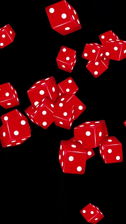 Red Dice Bursting and Falling Against a Solid Black Background Stock Footage 345125063