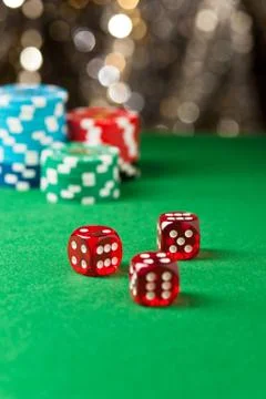 Red dice on a casino table Foto stock