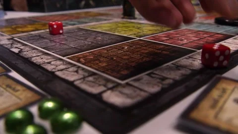 Red dice falling on game board from corner 動画素材 270437414