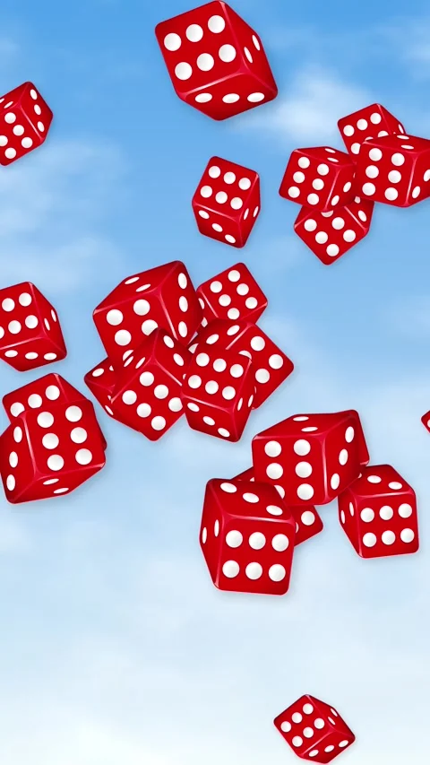 Red Dice Falling Through a Blue Sky with Soft Clouds Stock Footage 345206563