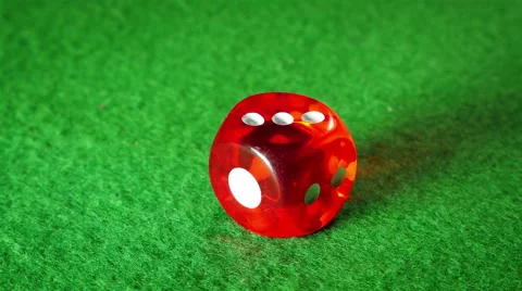 Red dice on the green cloth background. Rotation. Number. Stock Footage 58642863