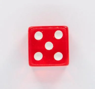 A red dice with the number five to play Stock Photos