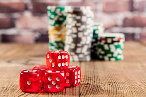 Red Dice on Table Stock Photos