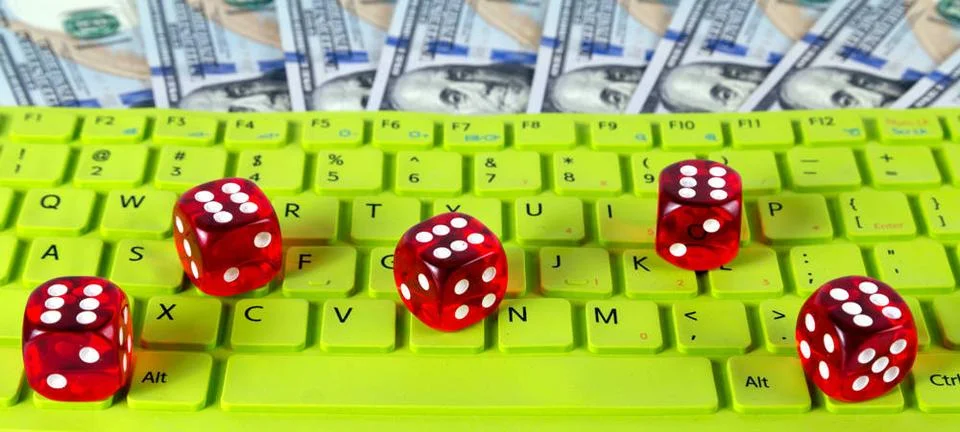 Red dices green button key US Dollar bills Red dices green button key of k... Stock Photos