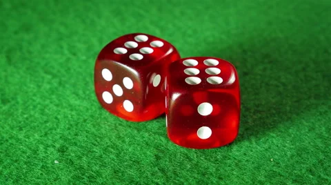 Red dices on the green cloth background. Rotation. Double six. Stock Footage 58614909